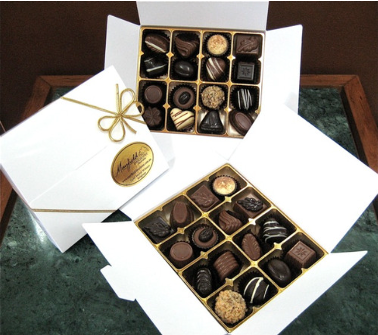 Gourmet chocolates product display available from Spring Hill Florist gift collection.